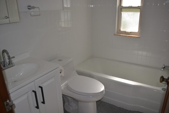 Stylish mosaic tile flooring in bathroom - 31 Marylea Ave