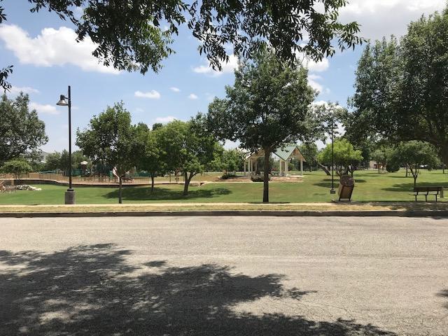 Park across the street - 208 E Twohig Ave