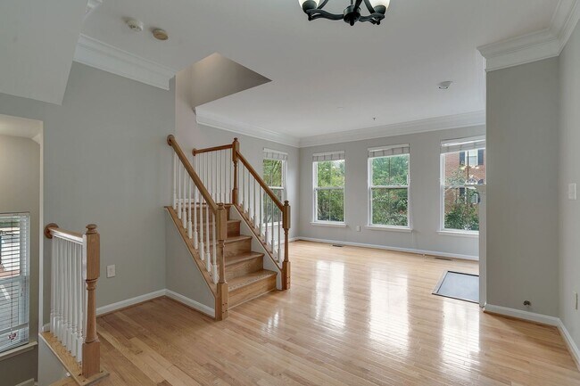 Building Photo - COMING SOON - Great 4 level end unit TH in...
