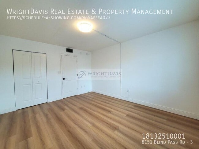 Building Photo - 8151 Blind Pass Rd
