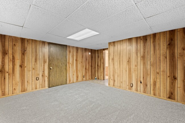 basement living room and utility - 3061 W 92nd Ave