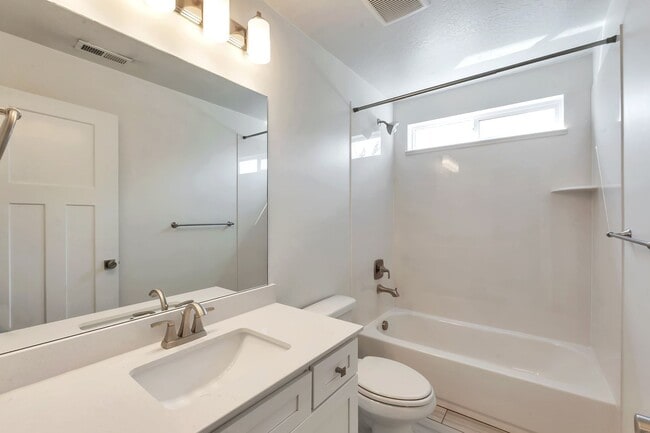 Building Photo - Modern Row End Townhome w 2 car attached g...