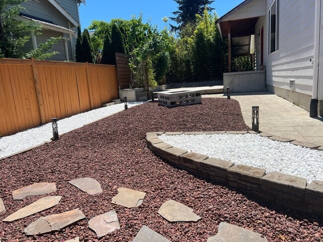 Building Photo - Spacious 4 Bedroom Home with Zen Backyard and 3-Car Garage