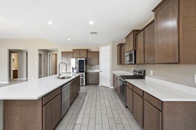 Building Photo - Spacious 5-Bedroom Home with Open Floor Plan & Private Backyard