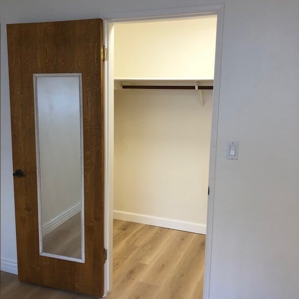 PRIMARY BEDROOM WALK IN CLOSET - 8322 Mango Ave