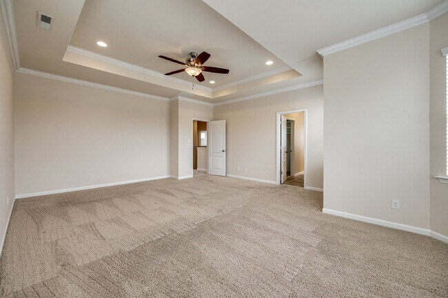 Building Photo - "Spacious 4-Bedroom Retreat with 3 Full Ba...