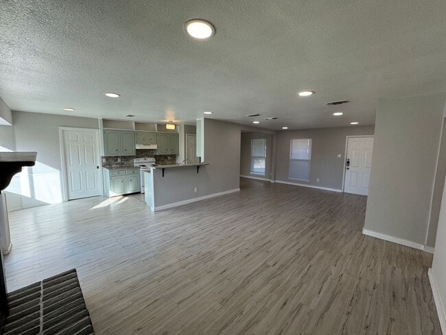 Building Photo - Welcome Home to Peace, Space & Comfort