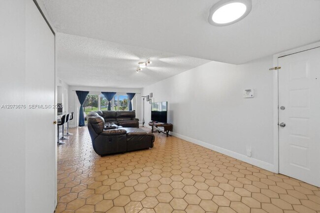 Building Photo - 7460 Woodmont Terrace
