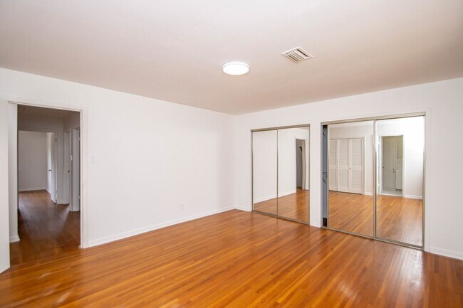 Building Photo - Welcome to a beautifully maintained 4-bedroom, 2-bathroom home located in the highly sought-after...