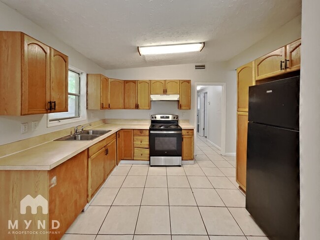Building Photo - 7045 Rollo Rd