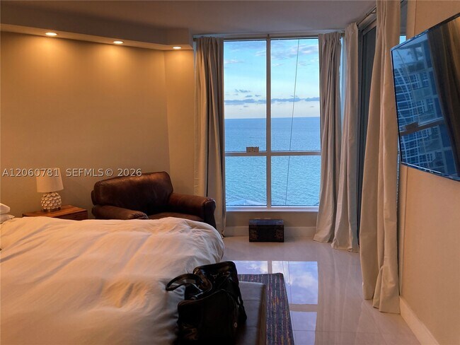 Building Photo - 6767 Collins Ave