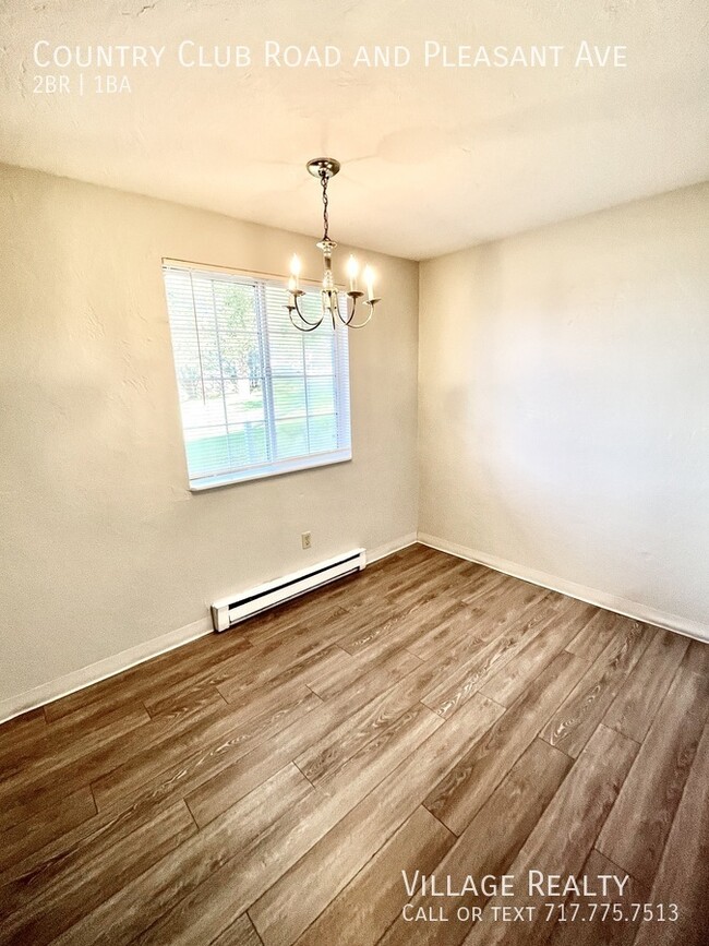 Building Photo - Roomy, remodeled 2-bed w/ on-site laundry ...