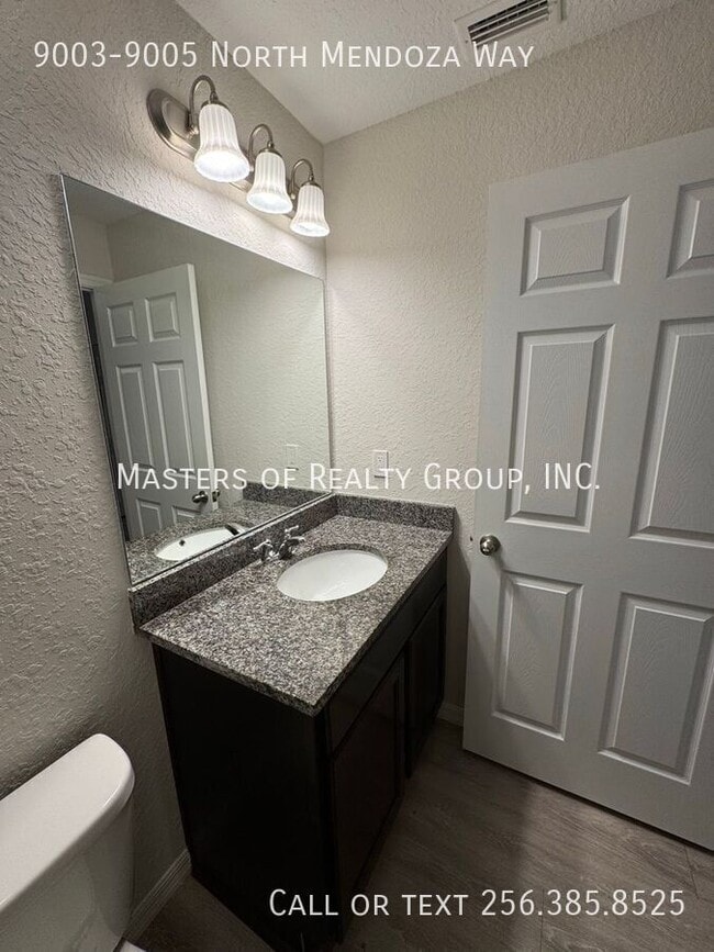 Building Photo - 9003-9005 North Mendoza Way-