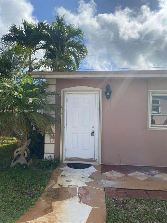 Building Photo - 10701 NW 23rd Ave