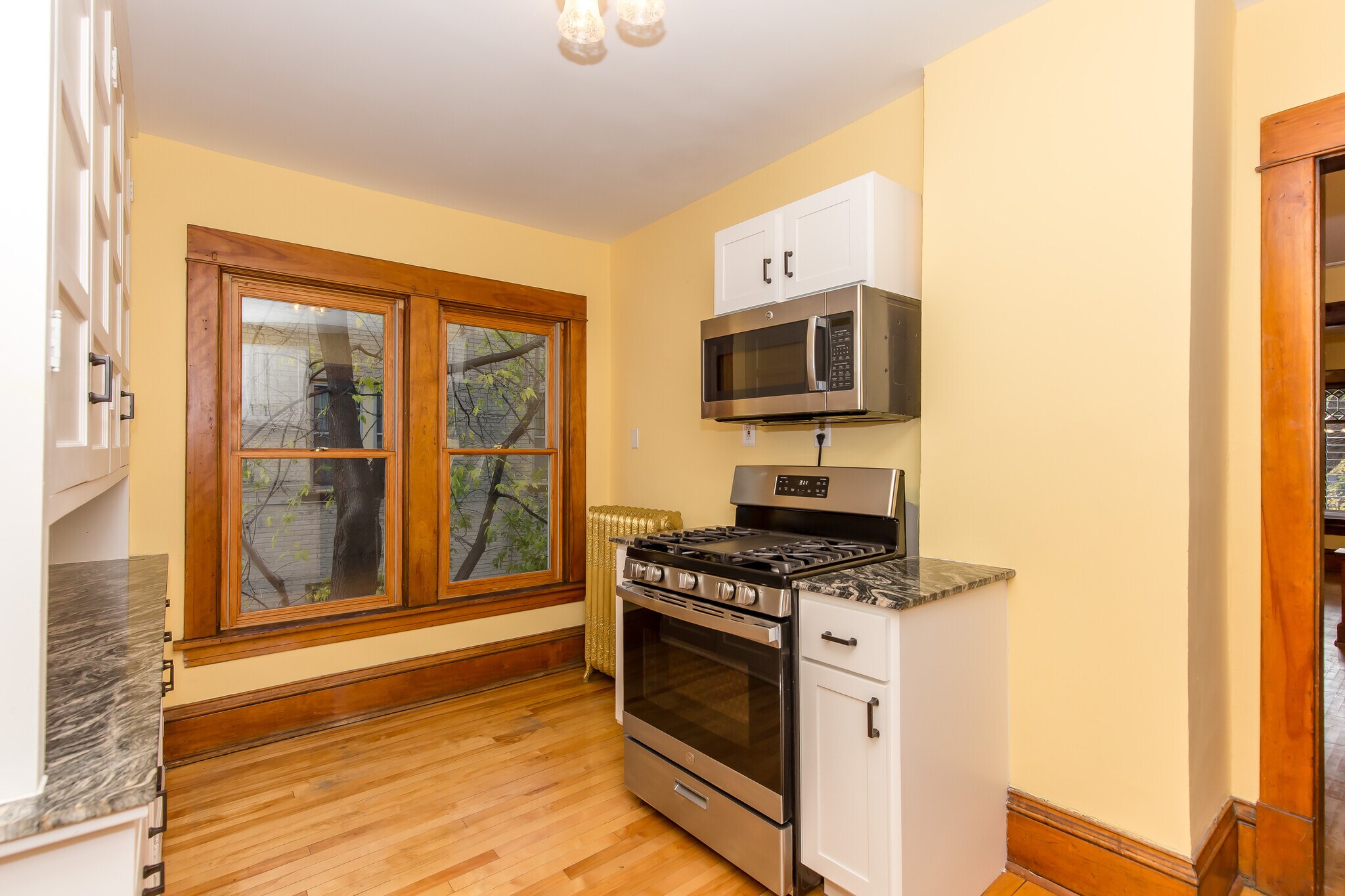Kitchen is bright and open with two large windows - 715 5th St SE