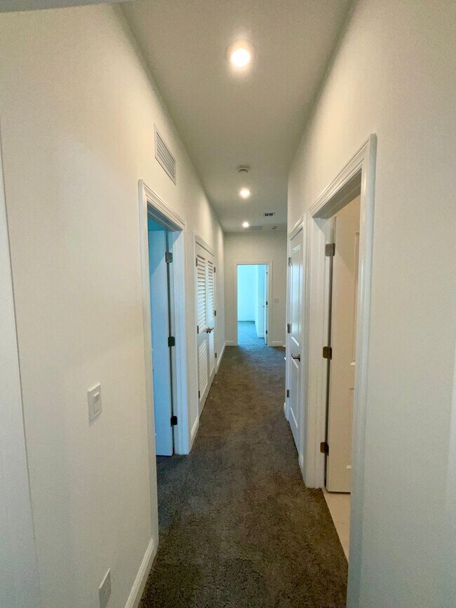 Building Photo - 3/2.5/2 Townhome in Rosette Park at Newfield