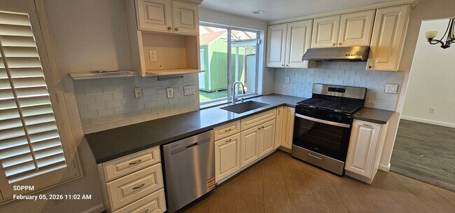 Building Photo - NORTH MIRA MESA / SAN DIEGO - Nice Renovated 4 Bedroom / 2.5 Bath House.  AVAILABLE 02/16/2026