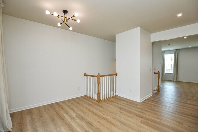 Building Photo - 3 Bedrooms | 2.5 Bathrooms | Lower-Level Flex Room | Approximately 1,978 Square Feet | 2-Car Gara...