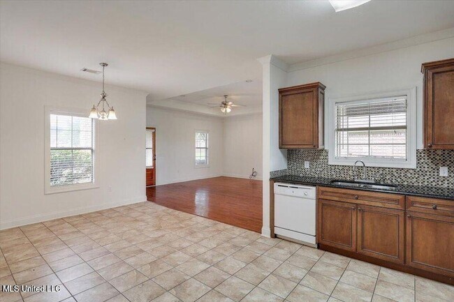 Building Photo - 409 Sand Stone Pl