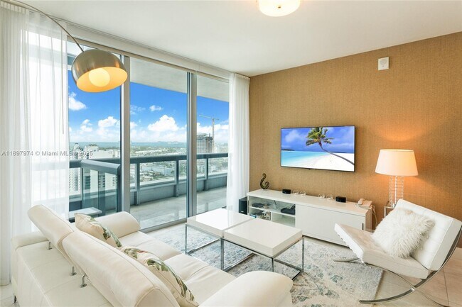 Building Photo - 6899 Collins Ave