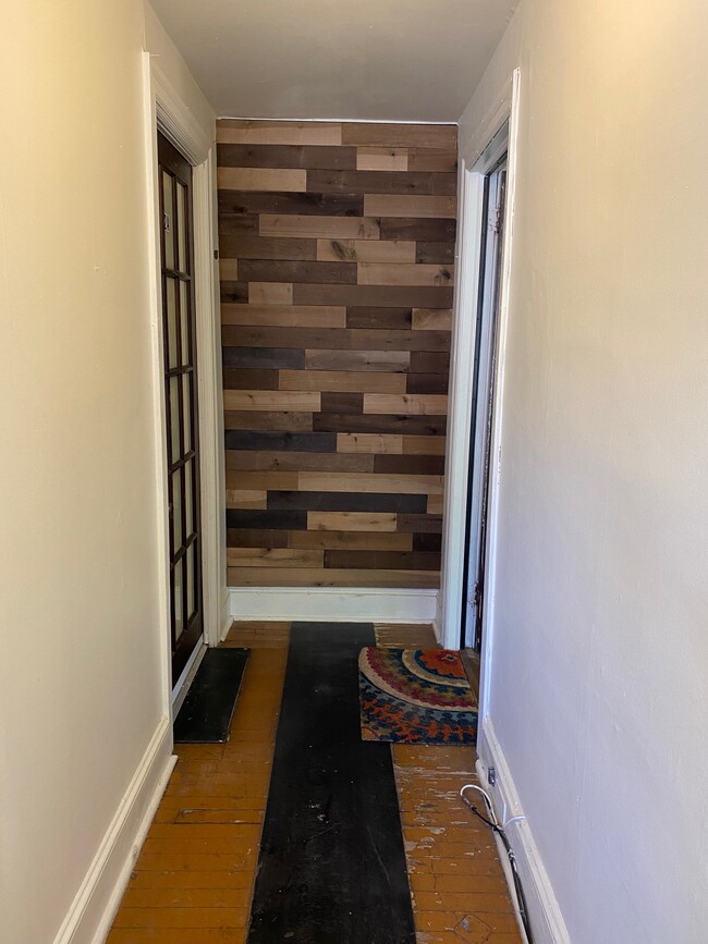 Custom accent wall in hallway - 2630 Mount Rd