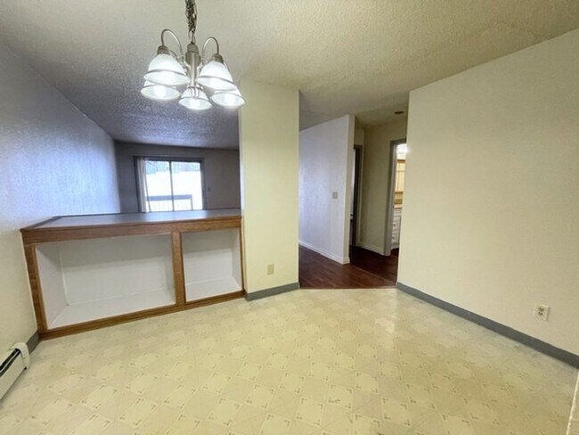 Building Photo - East Anchorage Condo with Laminate Floorin...