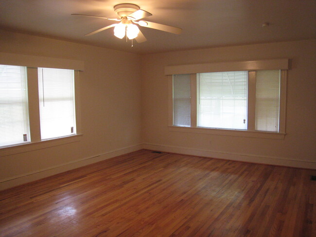 Family room. - 1911 E 4th St