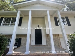 Building Photo - Must See Home near Lake Carroll