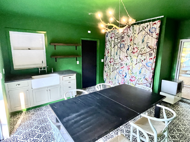 Community space: room w kitchenette and table - 608 Sparkes Rd