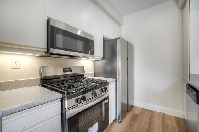 Building Photo - Coastal Living at Its Best – Upgraded 1BR Condo with Private Patio & Resort-Style Amenities