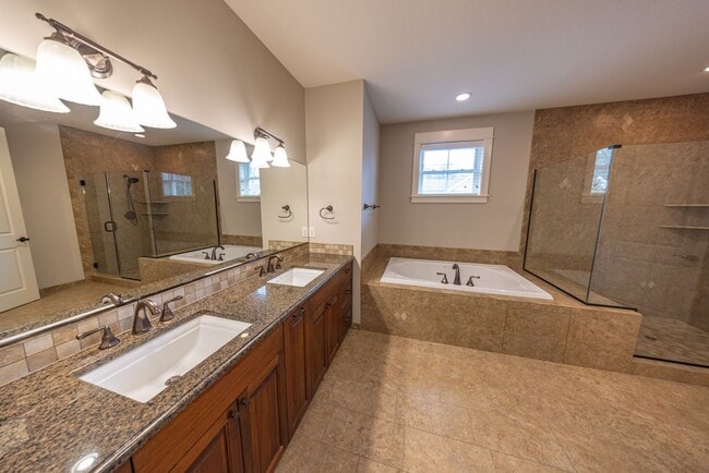 Building Photo - 2 Creeks Condominiums - Gated Community on...