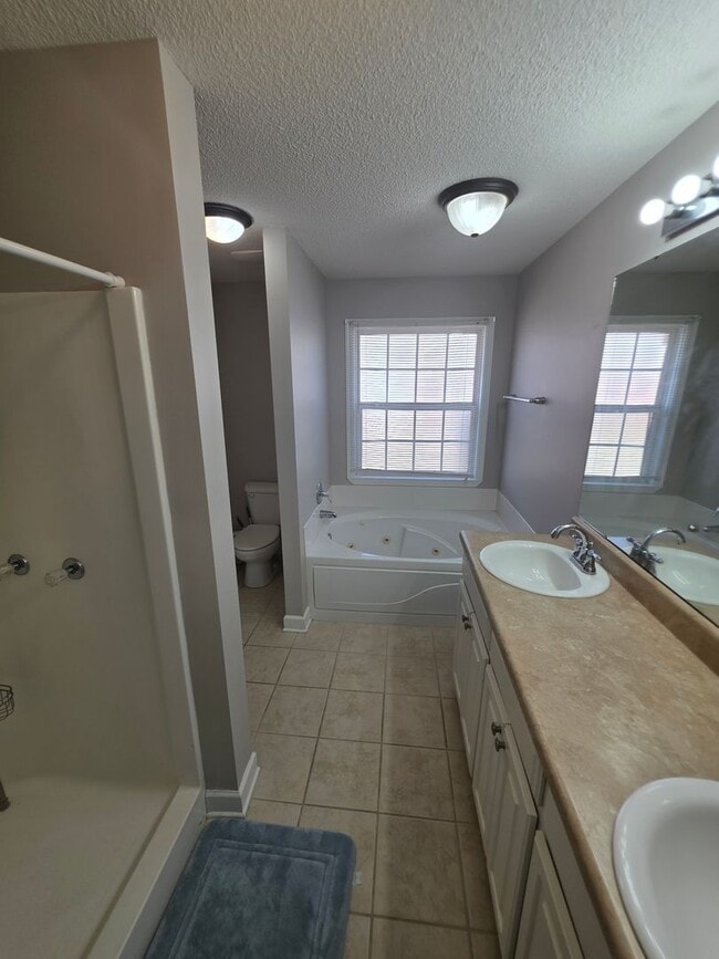 Building Photo - Available May! Non-Furnished Unit!