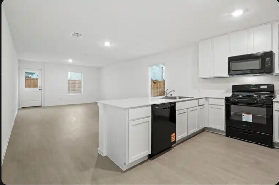 Walking into the kitchen - 726 Sandhill Crane Ln