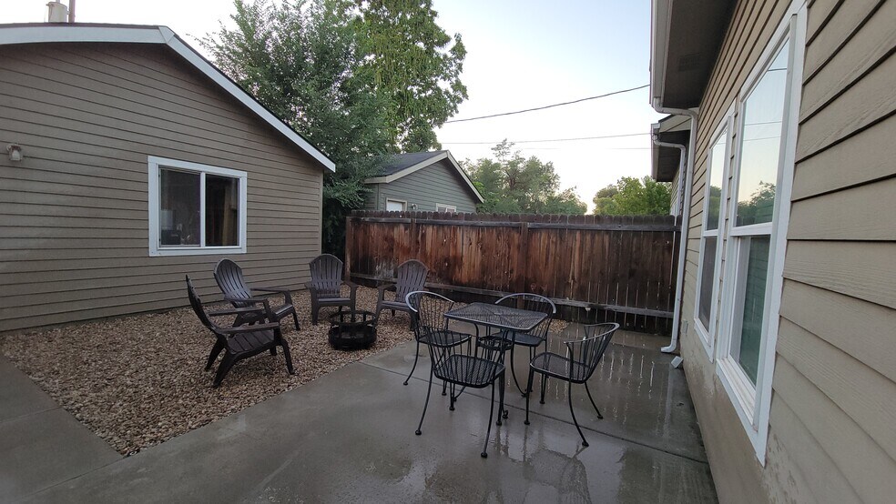 Backyard sitting area with BBQ, lighting and plants will be added - 2127 S Leadville Ave