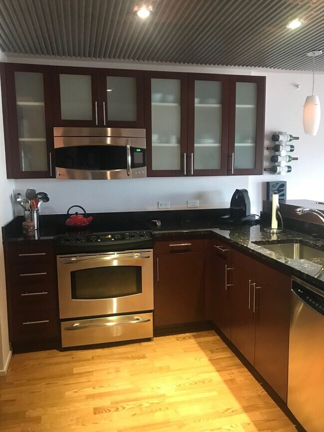 Building Photo - MONTAGE GEM With ALL UTILITIES INCLUDED