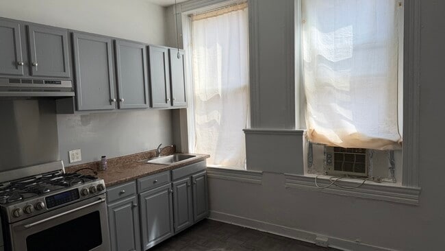 Building Photo - 1 Plus Den Condo