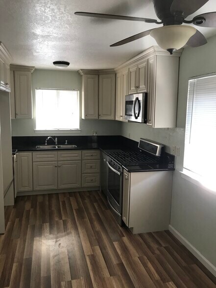 Updated kitchen cabinets granite counter - 6029 Rye Way