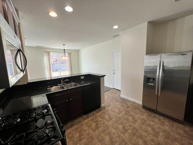 Building Photo - Four Bedroom South Reno Two Story Home with Washer/Dryer