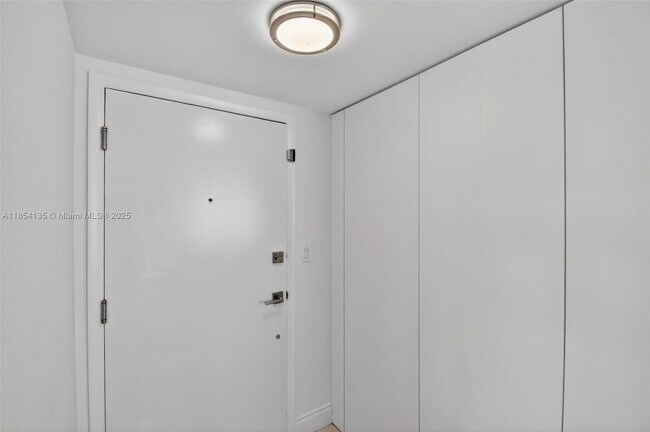 Building Photo - 9250 W Bay Harbor Dr