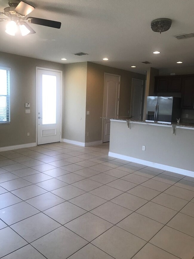 Building Photo - Lake Nona Townhome 3 Bed 2.5 Bath - Move in Special $500 off First Month Rent