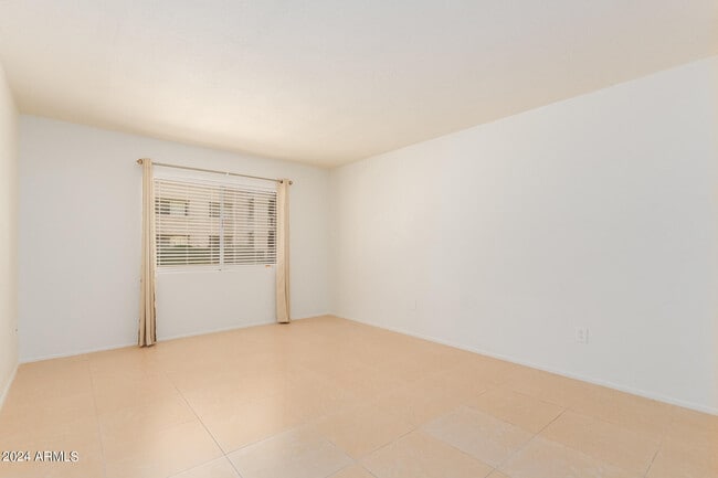 Building Photo - 7950 E Camelback Rd