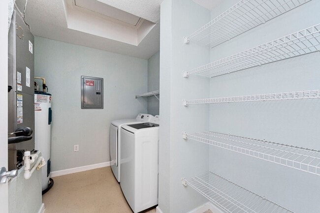 Building Photo - IMMACULATE 2nd Story condominium with so m...