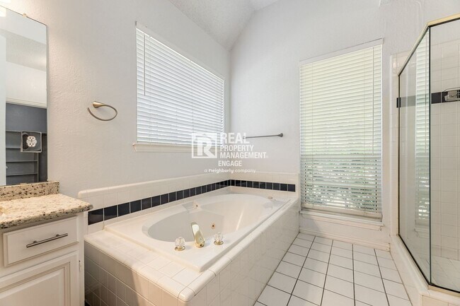 Building Photo - Recently Updated Plano Property with Modern Features and Serene Surroundings