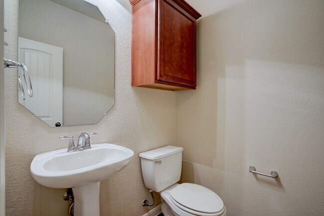 Building Photo - Bright & Roomy 4BR • 2.5BA • Two-Level Living