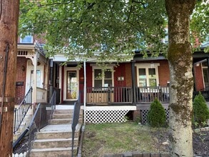 Building Photo - Charming 3 Story Brick Townhome Now Available