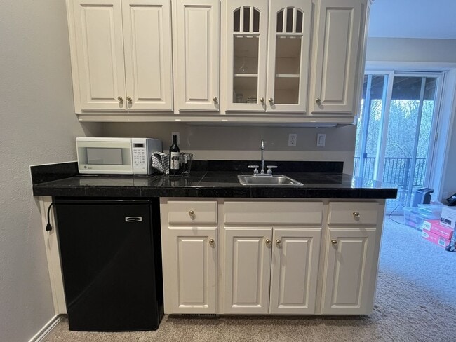 Building Photo - Executive-Style Northwest Heights Home with Forest Views and Refined Architectural Details