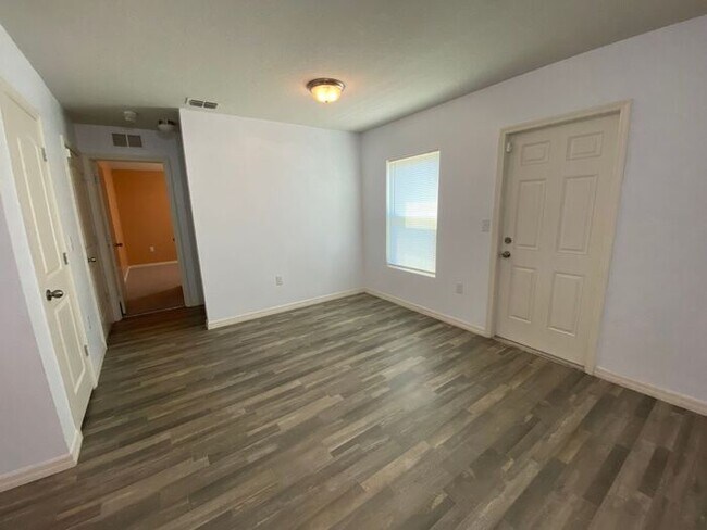 Building Photo - Four Bedroom / Three Bath Home