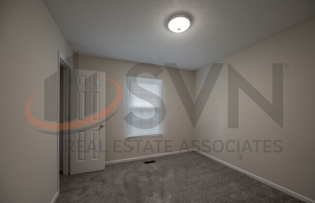 Building Photo - 3BR, 2BA Durham Home with Deck and LVP Flooring