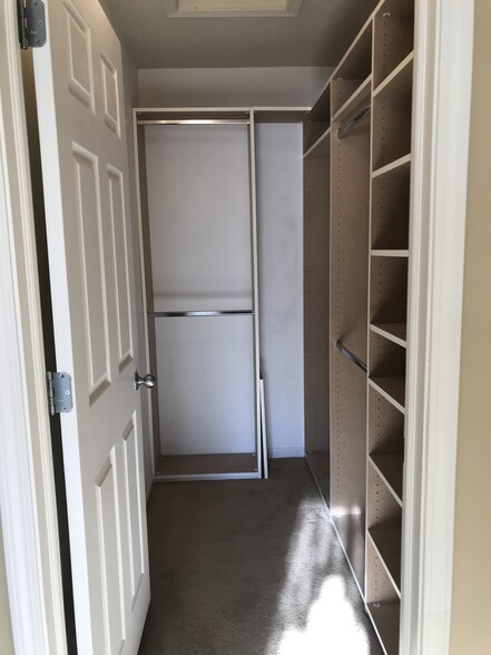 Master bedroom walk-in closet - 3173 Windcrest Dr NE