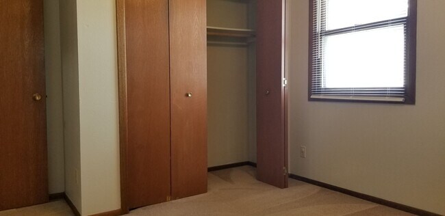Building Photo - HALF OFF FIRST MONTH'S RENT SPECIAL! 2 Bedroom 1 Bath Condo